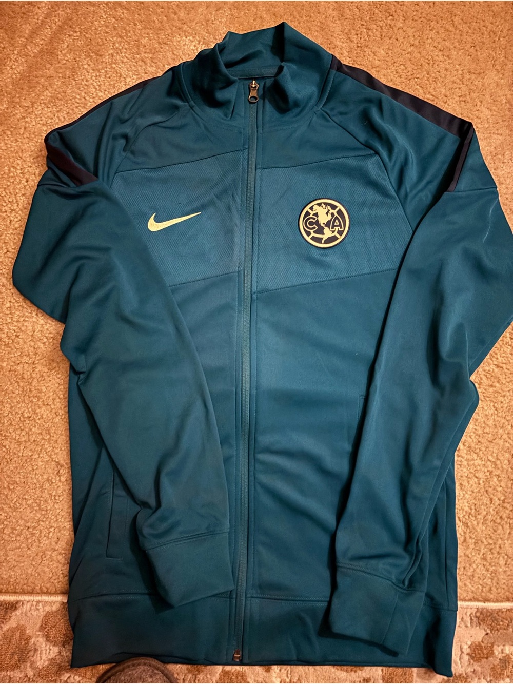 The Nike Club America 21/22 Academy Tracksuit (in Geode Teal/Armory Navy)